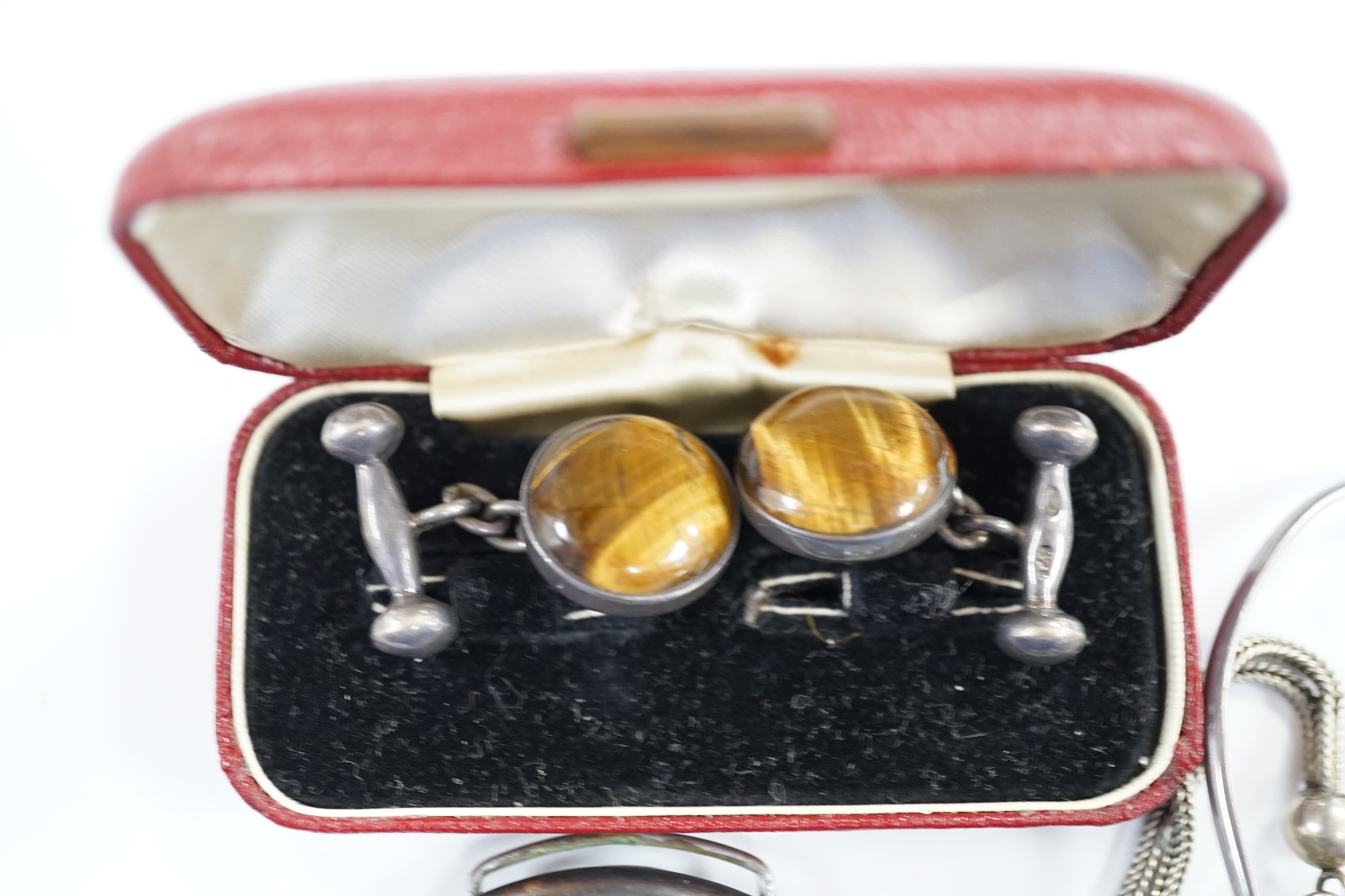 A pair of 925 and tiger's eye quartz set cufflinks, a silver and Scottish hardstone set brooch, a Scottish silver and rose quartz set bangle, a white metal fob watch and albertina and a base metal wrist watch.